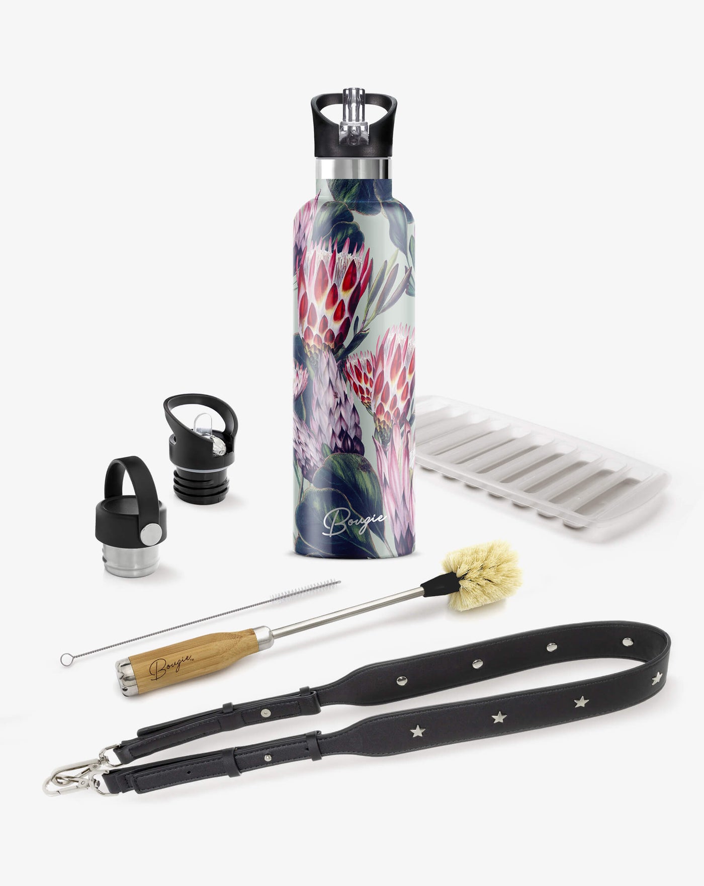 collection gift box with purple, red protea flowers with green leaf design water bottle, 2 lids, bottle brush cleaner, black strap bottler carrier and ice stick tray